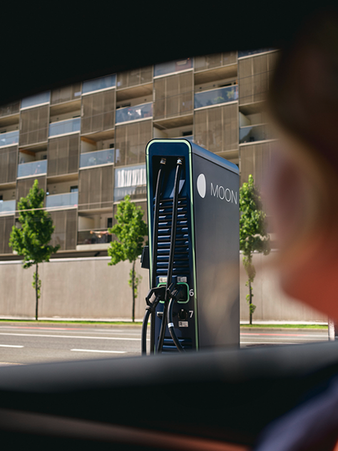Charging station in front of a street
